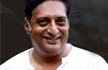 BJP members sprinkle ’divine’ cow urine to cleanse stage where Prakash Raj gave a speech